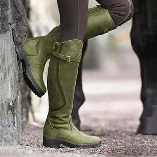 Women's waterproof brown riding boots with side zipper and buckle strap